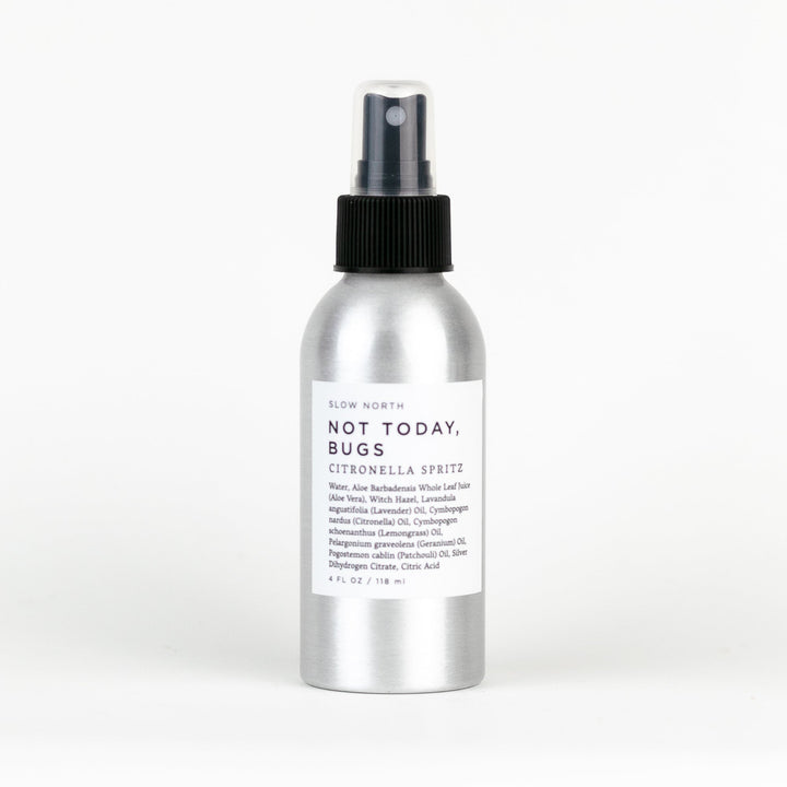 Not Today Bugs natural bug spray in a recyclable aluminum bottle with botanical label.