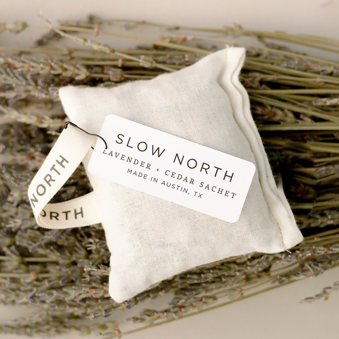 Compact cotton sachet pouch with lavender and cedar scent accents.