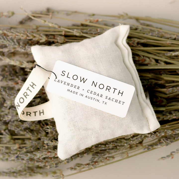 Compact cotton sachet pouch with lavender and cedar scent accents.