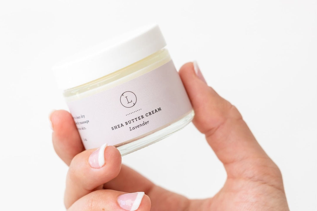 Lavender shea butter body cream, a rich moisturizer in a tub.