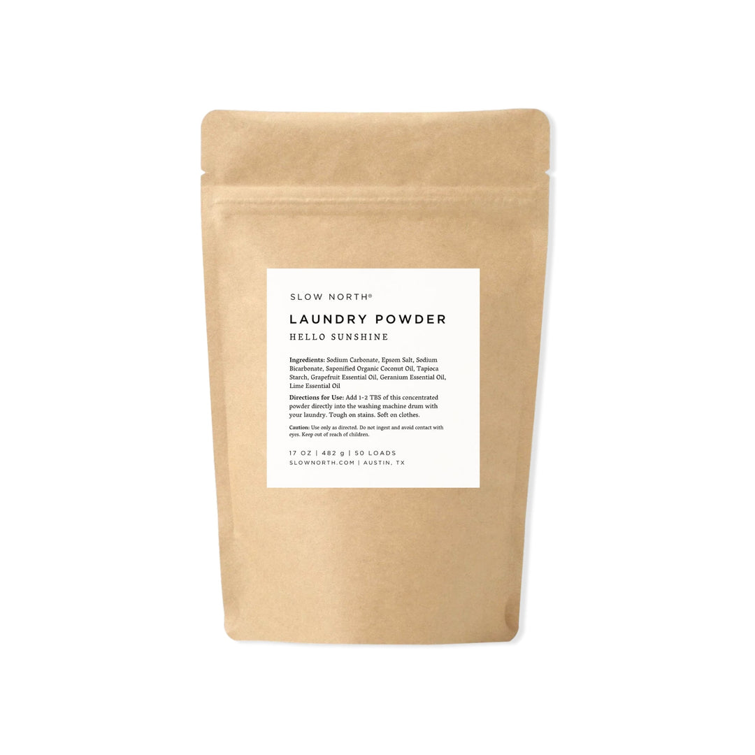 Hello Sunshine all-natural laundry powder in bright yellow packaging with citrus design.