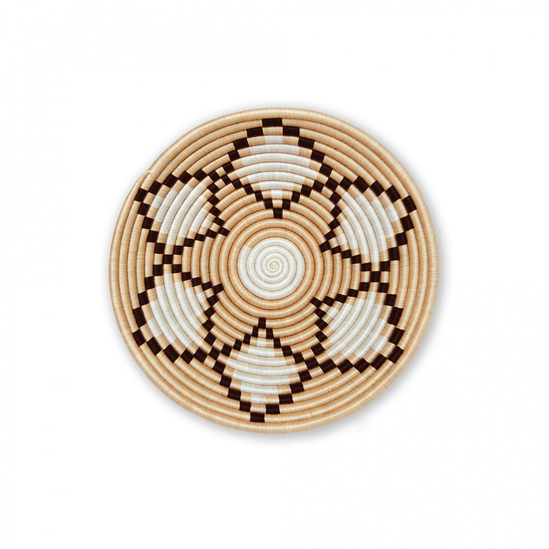Overhead view of a medium Neri natural sisal woven bowl with a black and natural pattern.