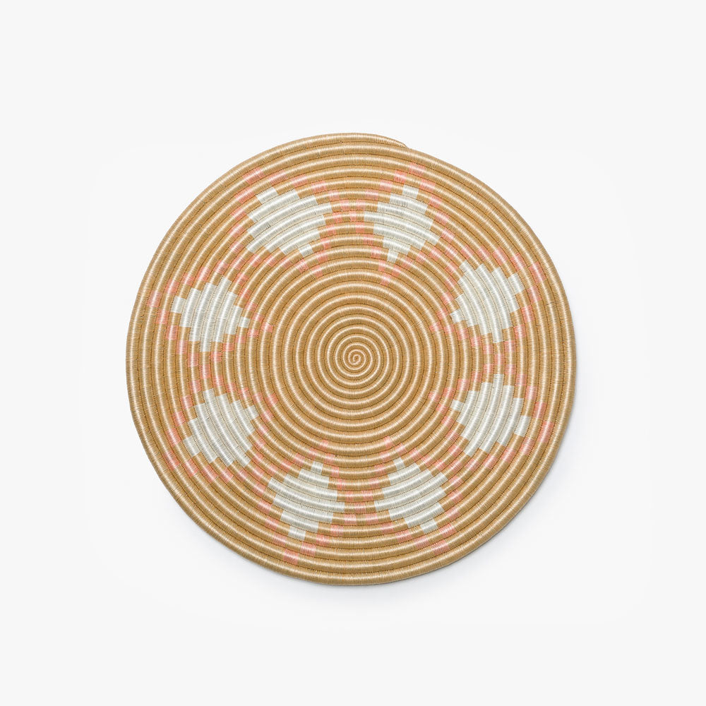 Small blush Neri flat woven sisal wall hanging with intricate weaving.