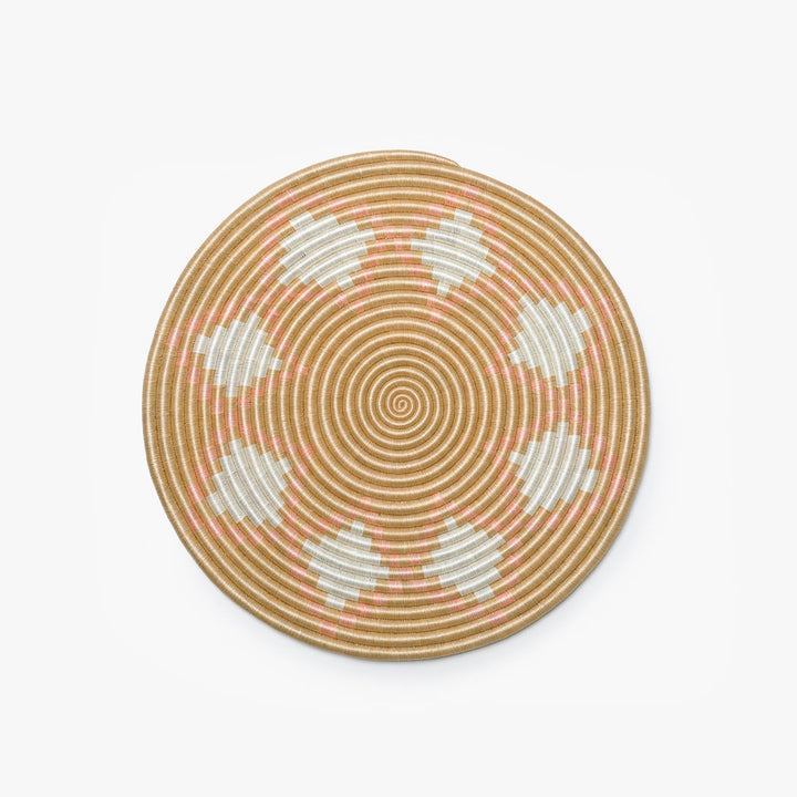 Small blush Neri flat woven sisal wall hanging with intricate weaving.