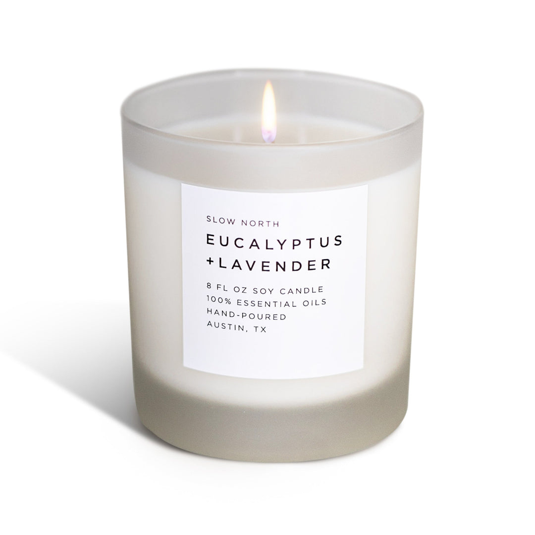 Eucalyptus lavender scented candle with essential oil blend in a clear glass container.