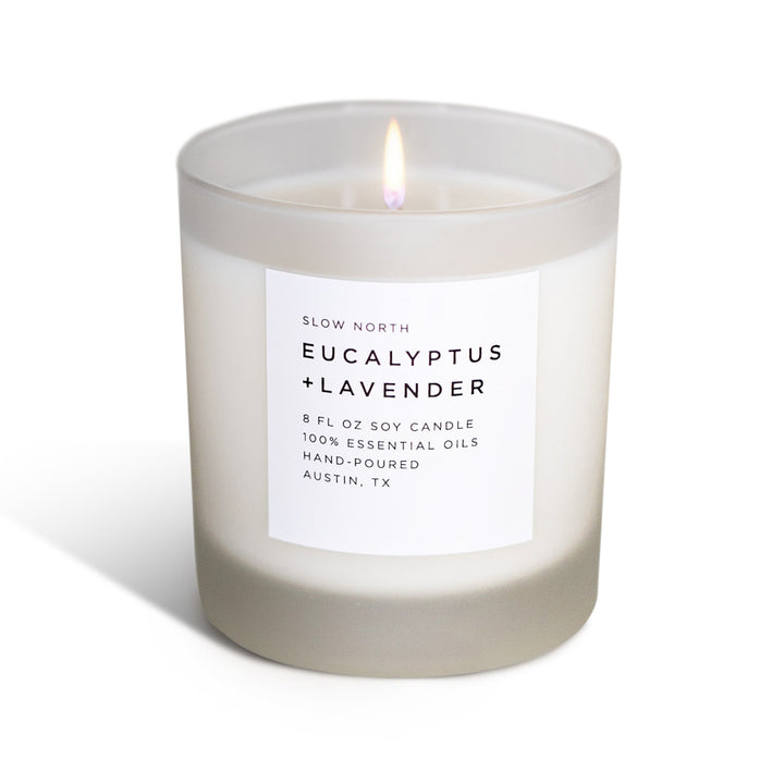 Eucalyptus lavender scented candle with essential oil blend in a clear glass container.