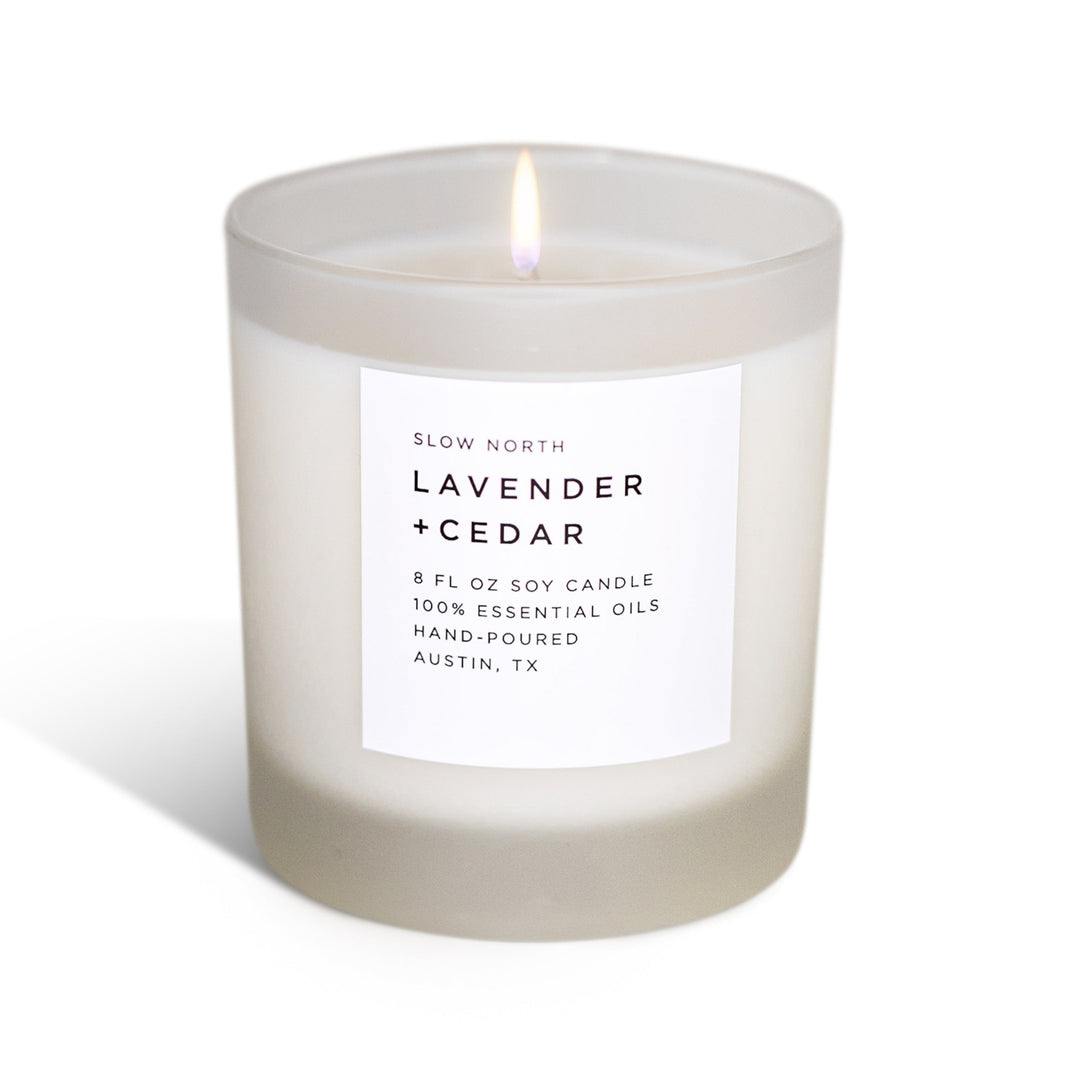 Calm and Grounded Candle Trio with three candles with essential oils in glass containers.