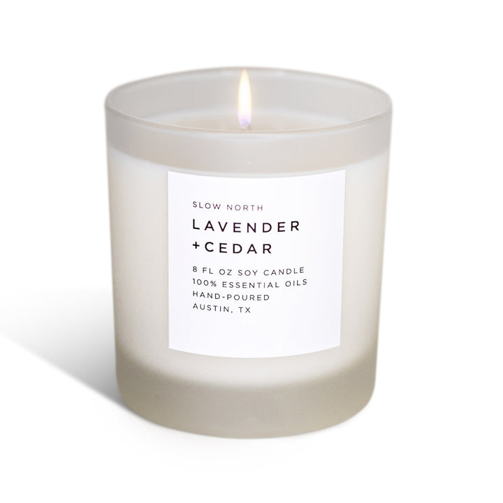 Calm and Grounded Candle Trio with three candles with essential oils in glass containers.