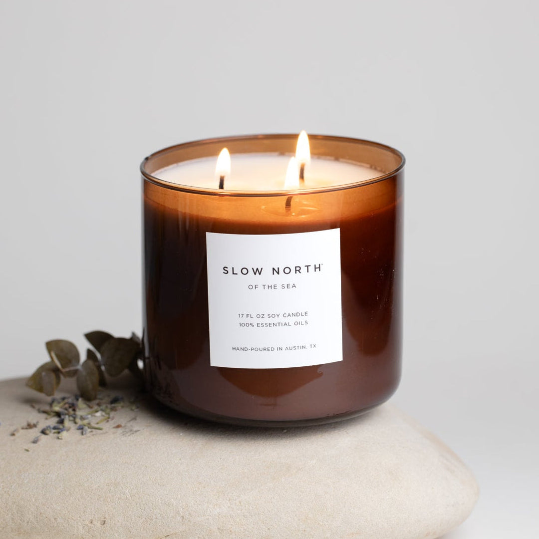 Of The Sea three-wick candle with a calming ocean-inspired design.
