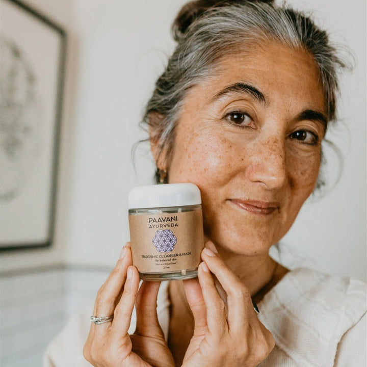 Tridoshic cleanser and mask with bentonite clay, creamy product in a jar.