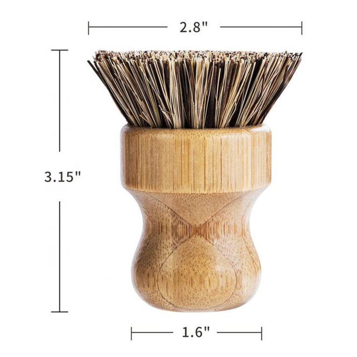 Bamboo and sisal dish brush with natural bristles for gentle, eco-friendly cleaning of dishes and kitchenware.