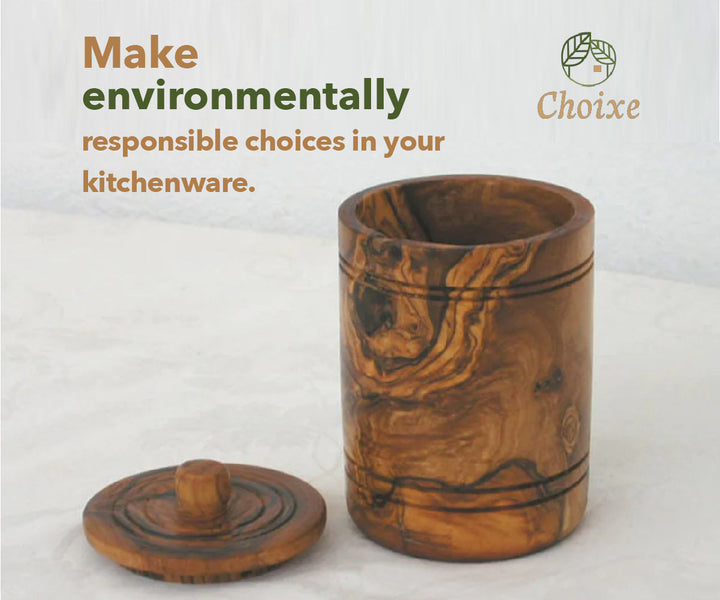 Hand-carved olive wood spice jar with lid, a rustic salt keeper with a smooth finish and natural grain.
