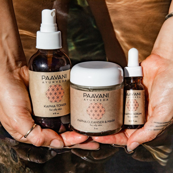 Kapha Ayurvedic skincare ritual with products and herbal ingredients.