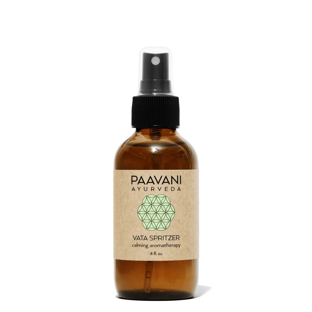 Vata palo santo aromatherapy spritzer in a clear glass spray bottle.