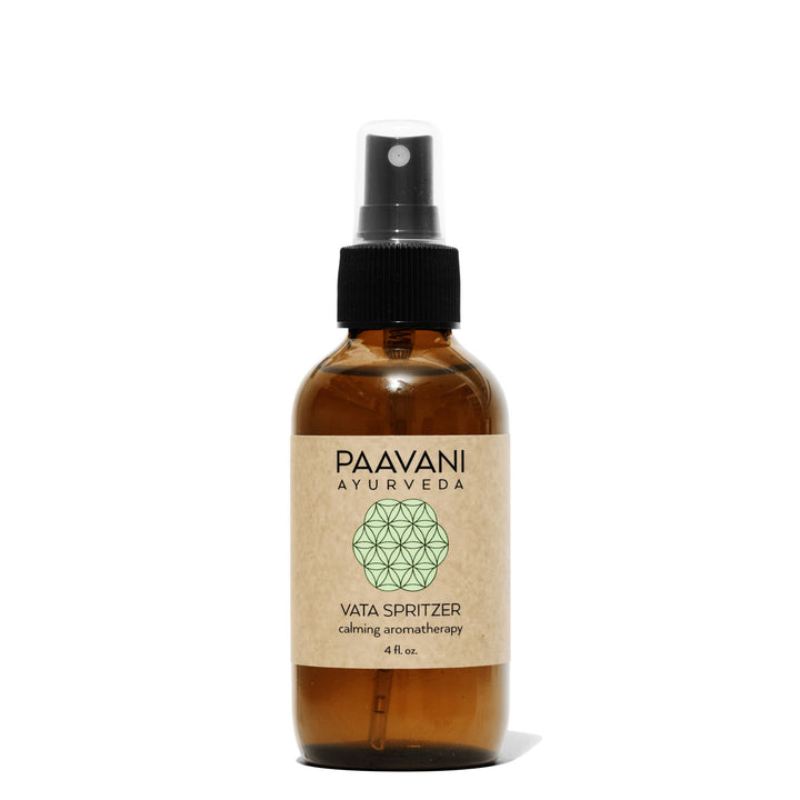 Vata palo santo aromatherapy spritzer in a clear glass spray bottle.