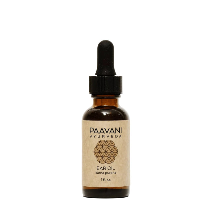 Ayurvedic ear oil with sesame and lavender in a glass dropper bottle.
