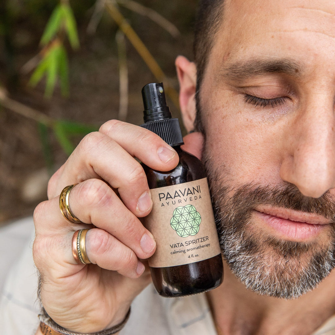 Vata palo santo aromatherapy mist in a glass spray bottle.