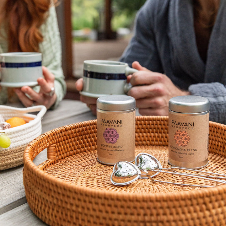 Heart-shaped stainless steel tea infuser for loose-leaf tea.