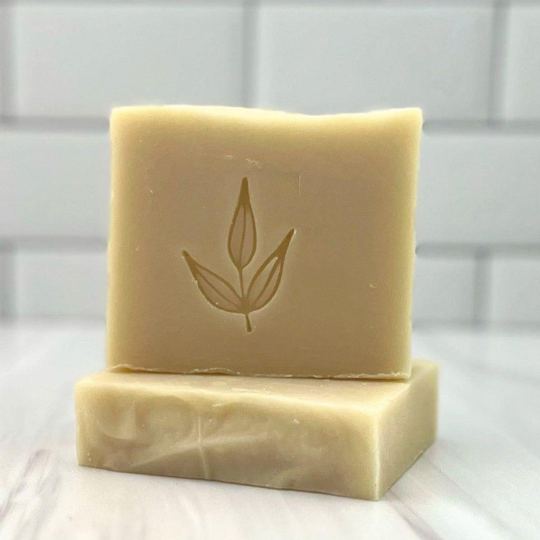 Castile bar soap with a textured surface and a natural, aromatic look.