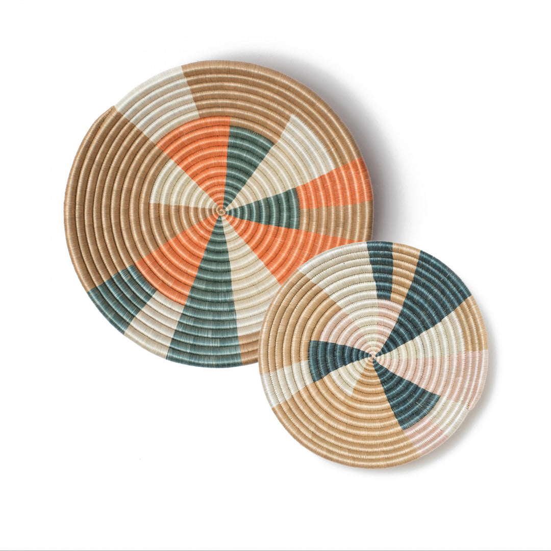 Overhead view of Prism woven sisal bowls with a multi-color pinwheel pattern.