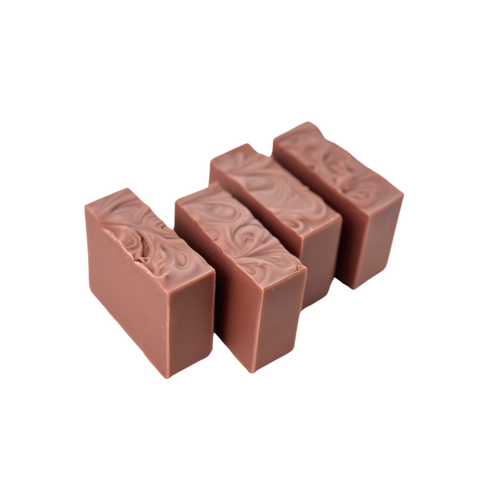 Bar soap 4-pack with eco-friendly kraft paper packaging and visible scent variety.