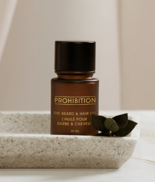 Prohibition beard oil in a bottle with a dropper, for grooming and softening beards.