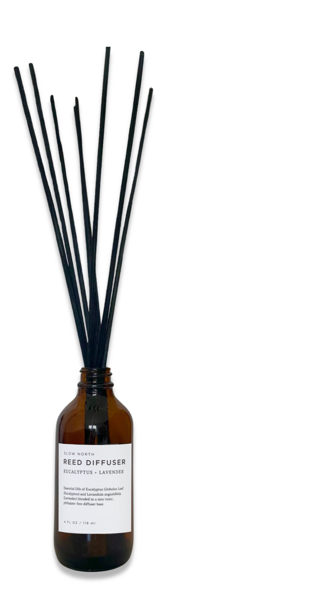 Eucalyptus lavender reed diffuser in a clear glass bottle with rattan reed sticks.