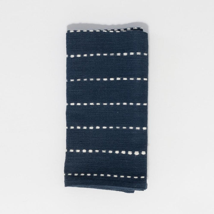 Navy handwoven cotton cocktail napkin, folded