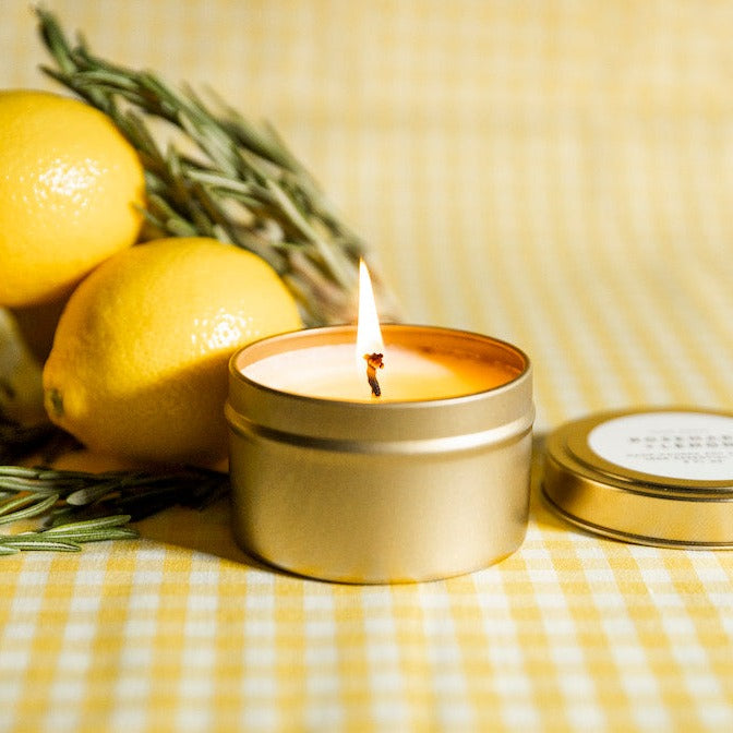 Rosemary lemon soy candle in a minimalist setting.