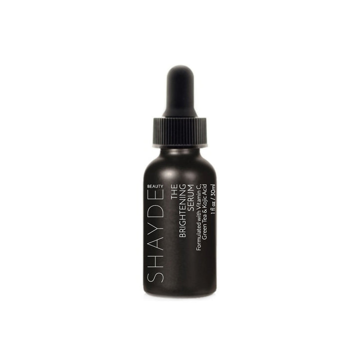 Vitamin C and kojic acid brightening serum in a bottle with a dropper.