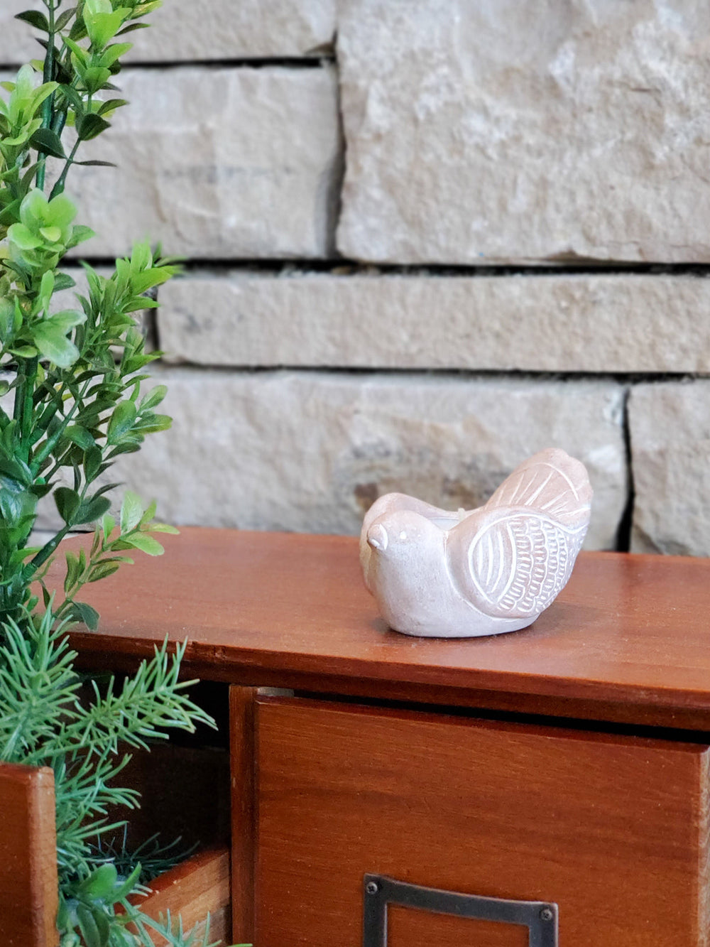 Bird terracotta tea light holder with a hollowed top for a tea light candle
