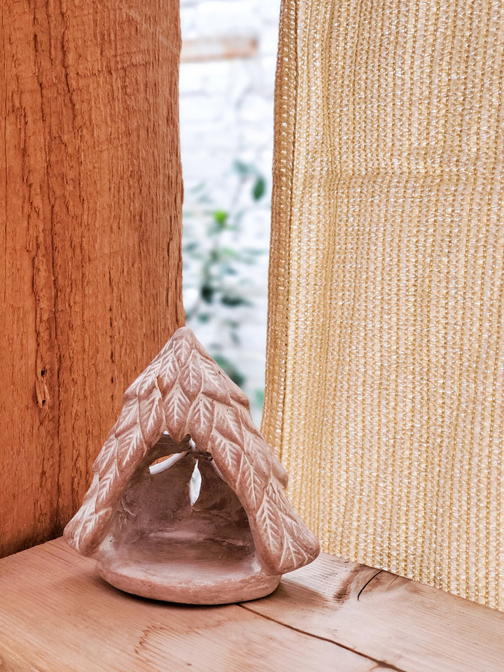 Tree terracotta tea light lantern with a hollow interior for a candle