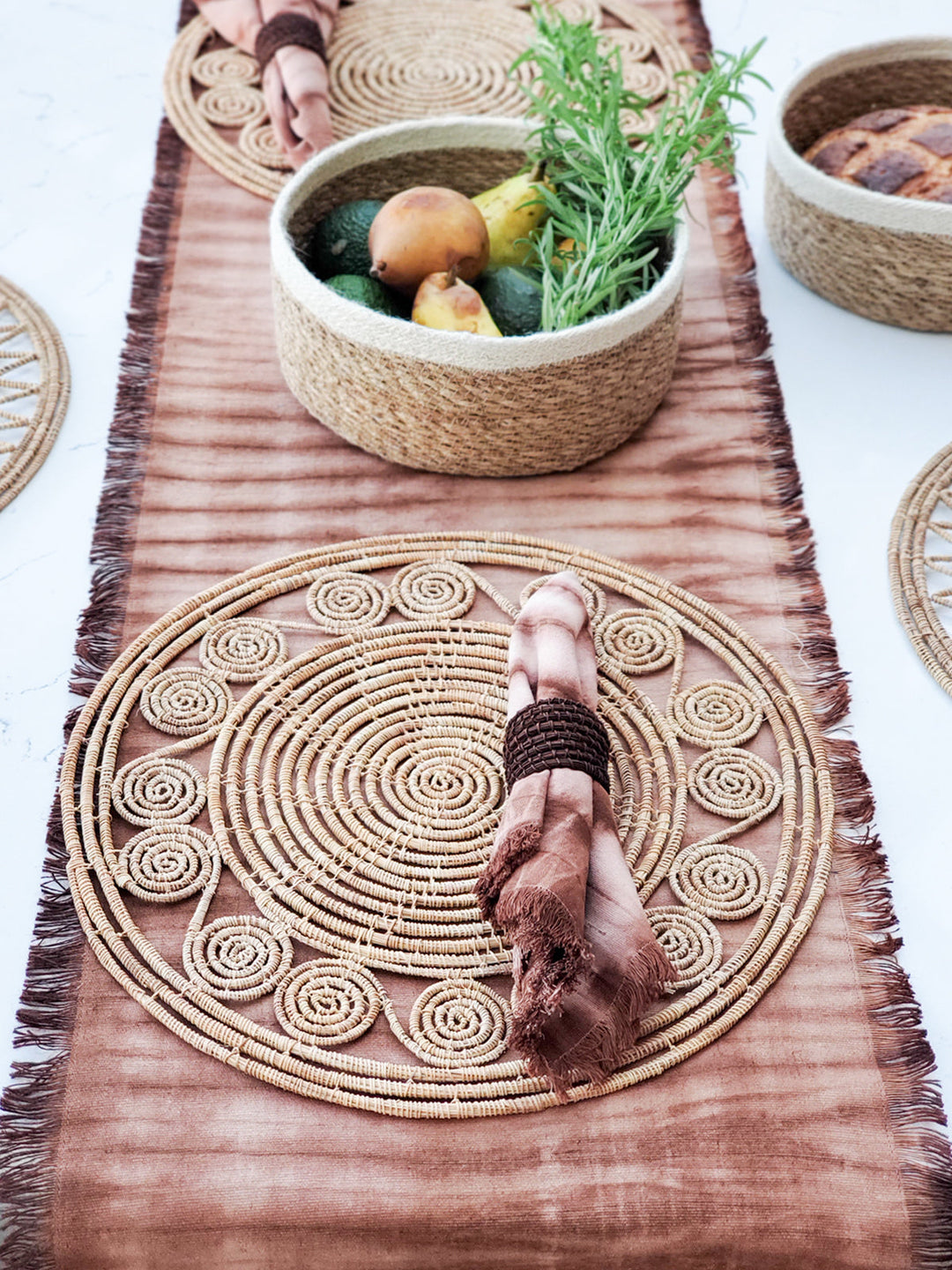 Hand-dyed shibori cotton dinner napkins in warm rust hues with fringed edges, set of 4