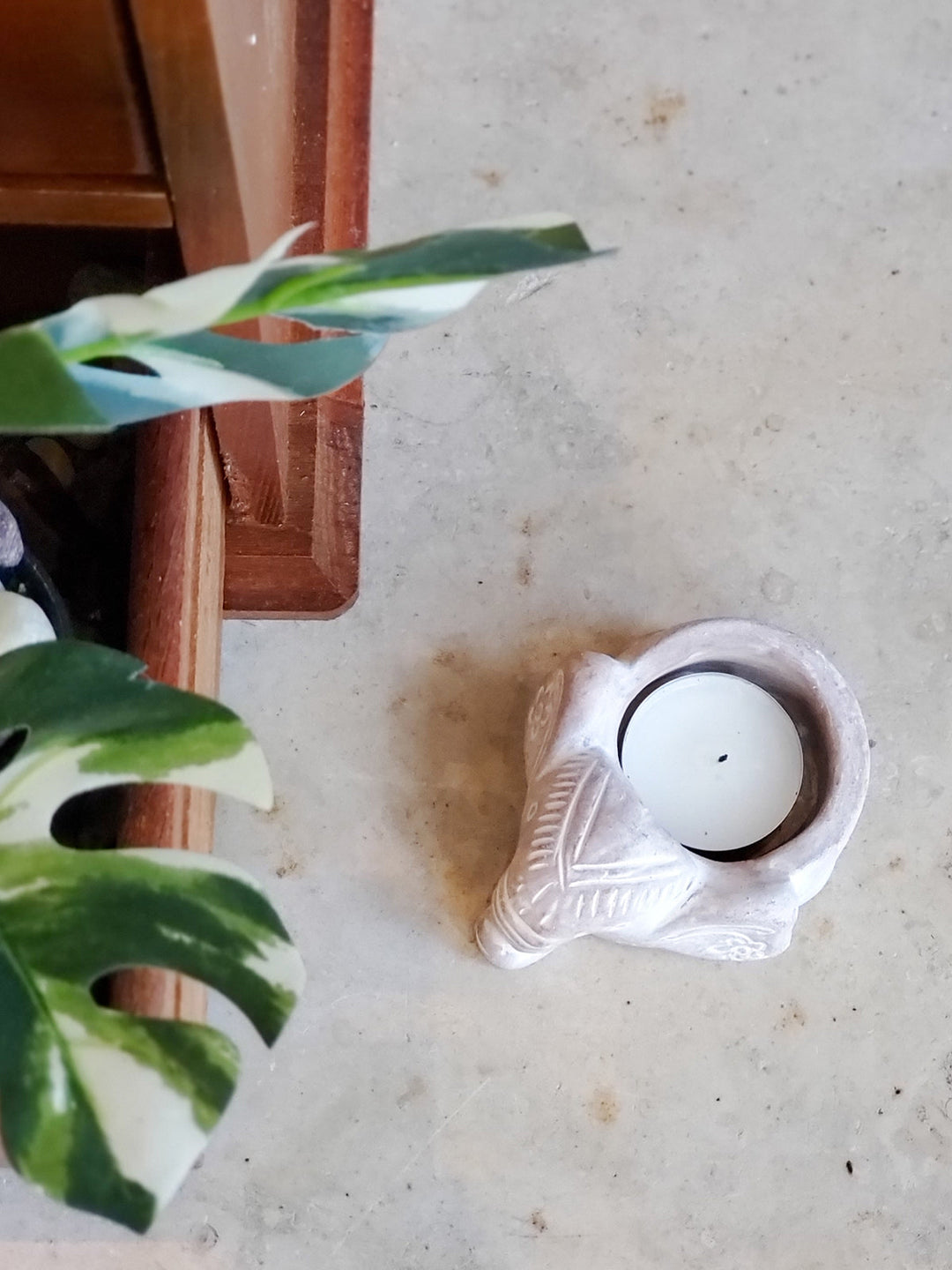 Rustic elephant terracotta tea light holder with carved details
