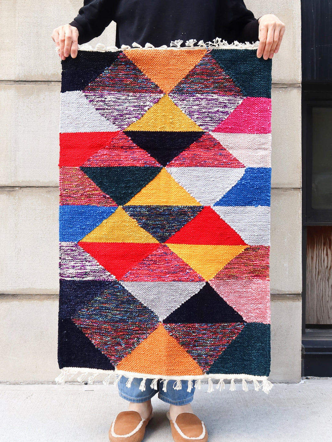 Sustainable hand-loomed chenille area mat from upcycled fabric scraps
