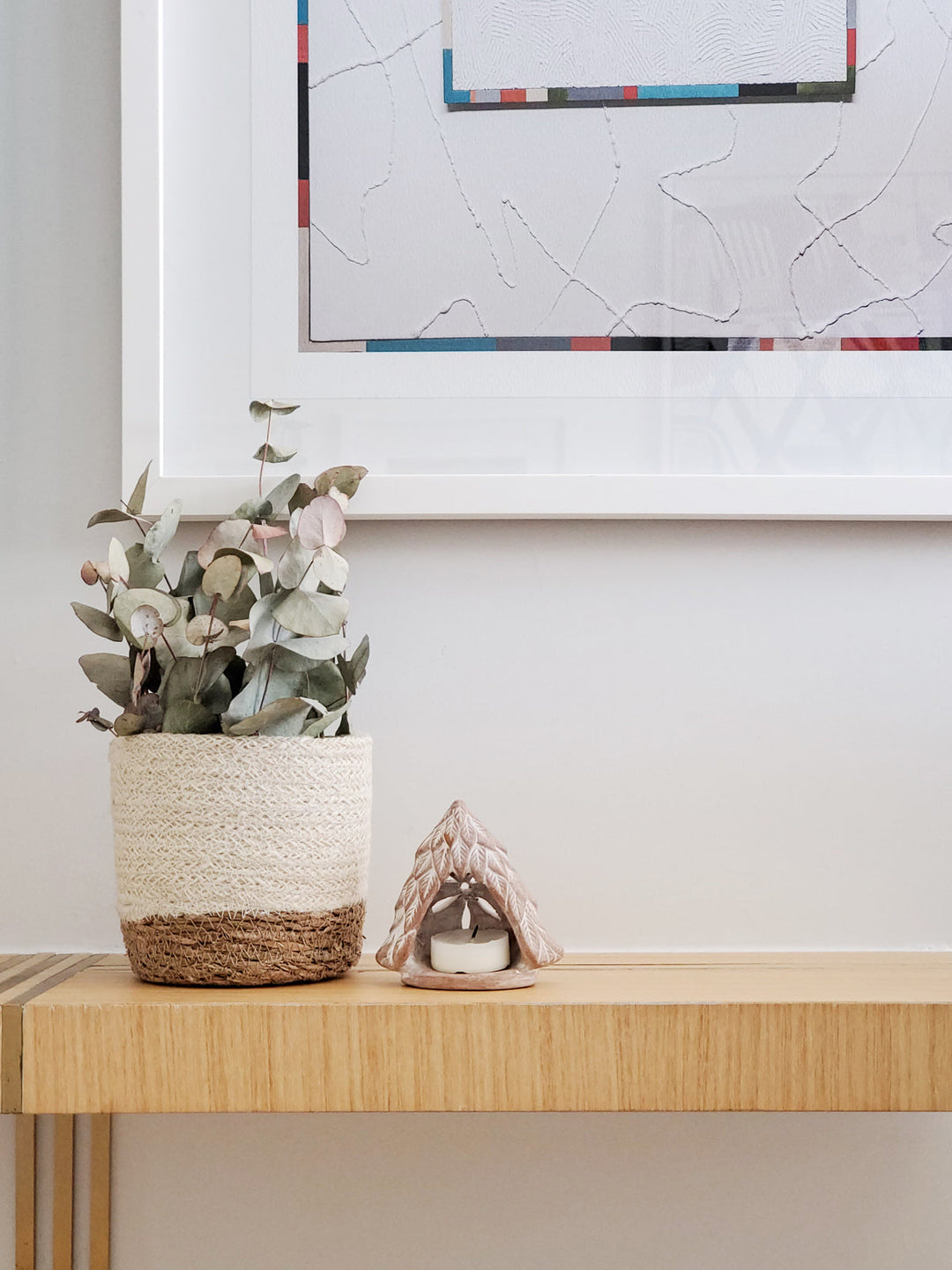 Tree terracotta tea light holder with a textured surface and open top