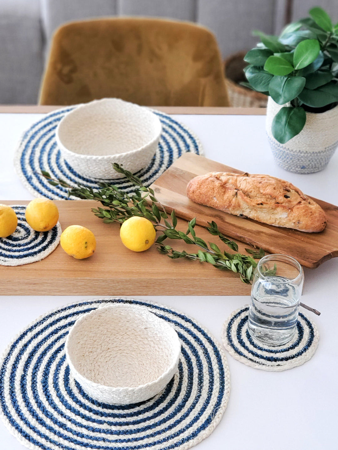 Blue round Kata Spiral placemat set by DC-KORISSA, showcasing a textured spiral design on smooth surface.