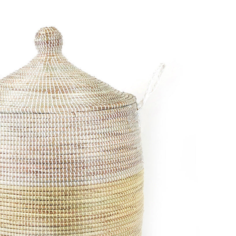 Extra-large natural and white two-tone floor basket with handles.