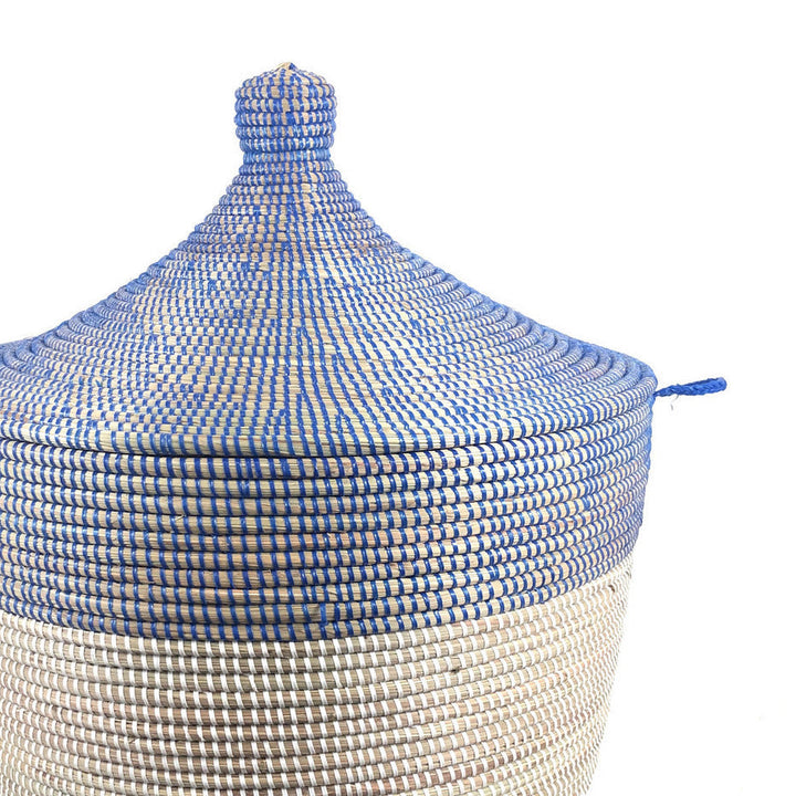 Navy and white tall two-tone floor basket with handles.