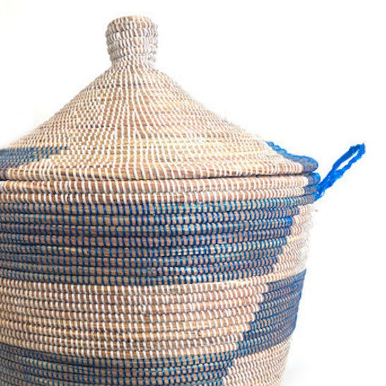 Blue stripe woven storage hamper with a spacious interior and lid.