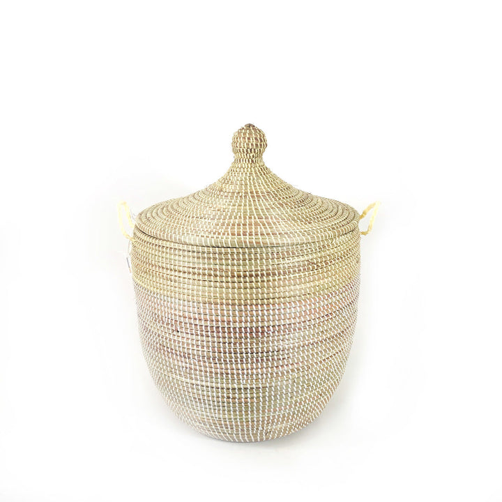 Medium two-tone storage basket in natural and white, handwoven Senegalese millet grass