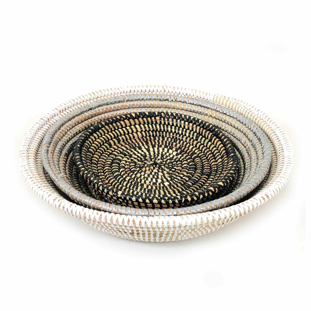 Handwoven neutral basket bowl set with natural fiber texture.