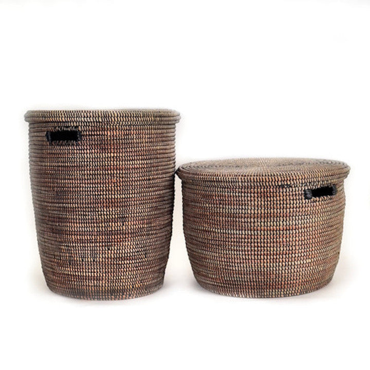 Black handwoven floor basket with flat lid, durable woven Senegalese millet grass.