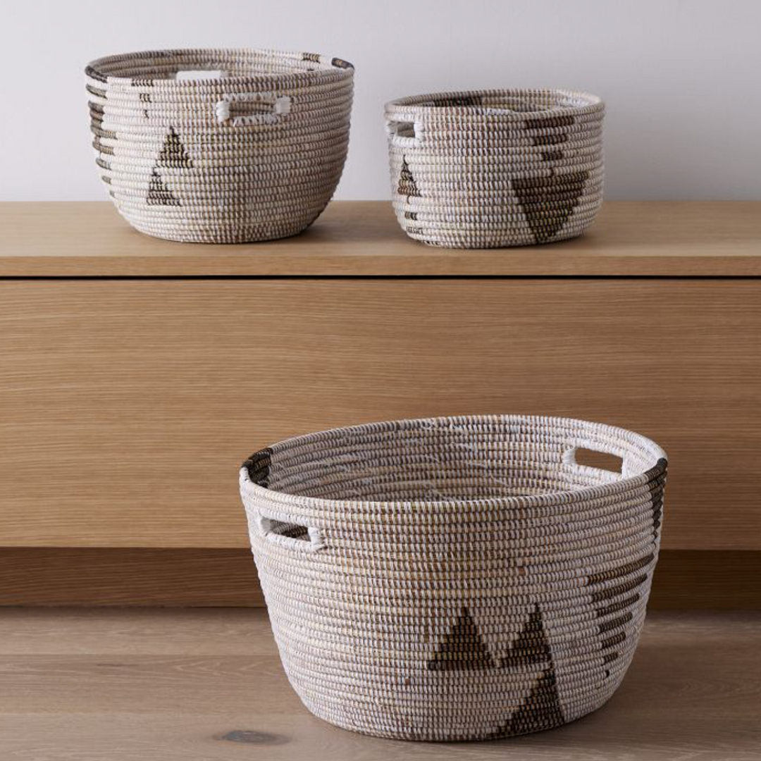 Set of three black and white graphic print oval baskets, handwoven in Senegal