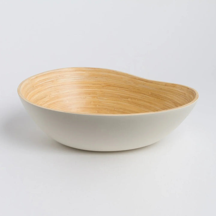 Bamboo serving bowl shaped like a mango, for fruit or snacks.
