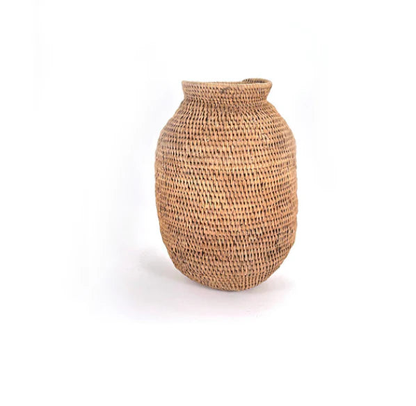 Handwoven Zimbabwean cane storage baskets with geometric patterns, Buhera District craft.