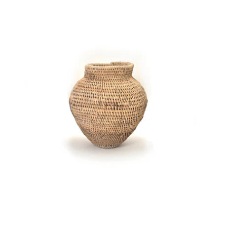 Handwoven Buhera storage baskets in Zimbabwean cane with bold geometric patterns.
