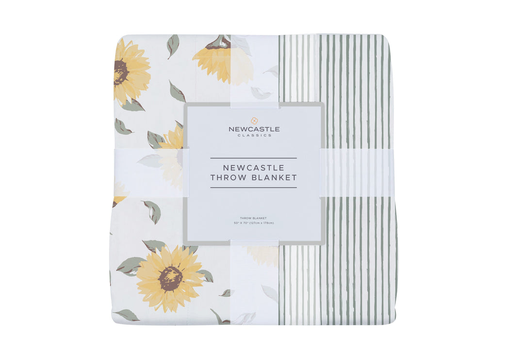 Bamboo muslin throw in a sunflower and sage stripe, soft and breathable fabric.