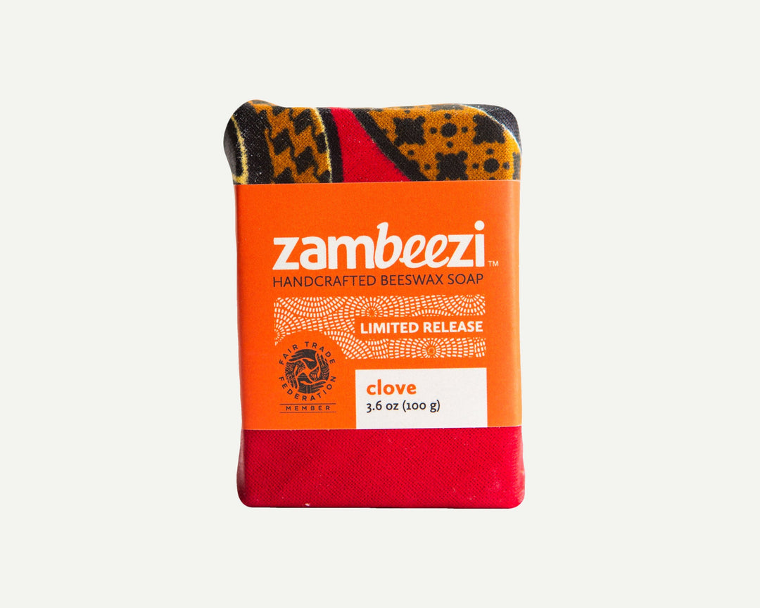 Handcrafted clove soap bar with a natural, rustic look, front view on a white background.