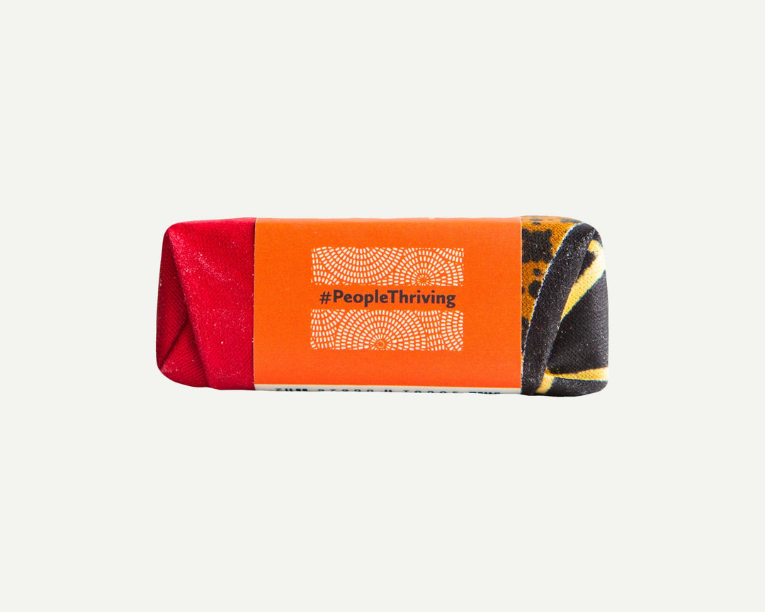 Handcrafted clove soap bar with a textured surface and natural ingredients.